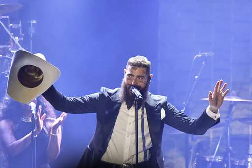 Post Malone performs during the Pre-Grammy Gala 